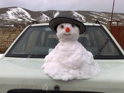 snowman on car