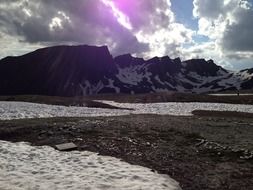 scenic mountains against the sky with large clouds, Austria