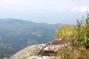 rock in front of mountain landscape, Sri Lanka, delthota