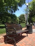 Brown bench in a park