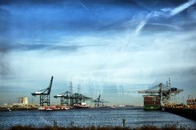 cranes in the port along the canal