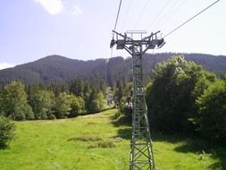 cableway in the mountains on a summer sunny day