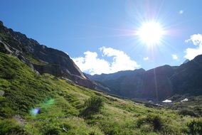 bright sun over the mountains in Switzerland