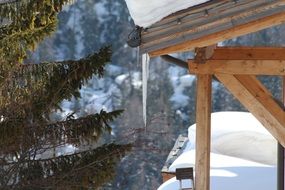 icicle on snowy roof