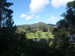 Landscape near the river with green hills