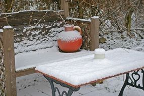 bench and table in the winter garden