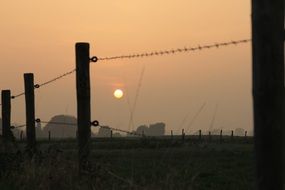 photo of the wires on a fence