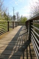 shadow of railings on the bridge