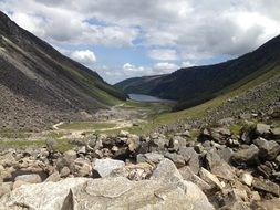 Remote view of the lake between the mountains in Ireland