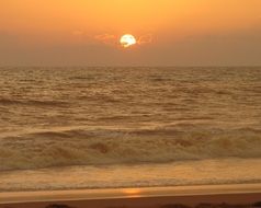 orange sea sunset in india