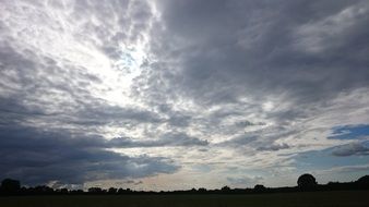 high fluffy clouds landscape