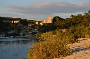 castle on a hill near the river