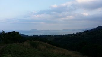 panorama of hills and forest at dusk