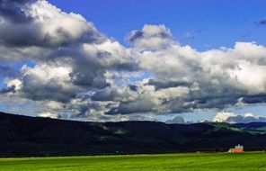 rural meadow and farm house