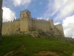 castle on the hill in Santa Olalla del Cala