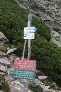 warning signpost on hiking trail, polish tatras