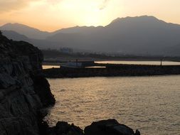 landscape of rocky coast at sunset