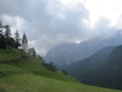 a church in dolomites mountains Italy
