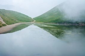 fog over mountain lake