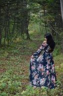 unusually beautiful girl in forest