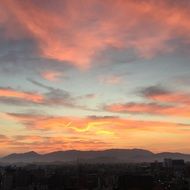 distant view of the mountains at sunrise