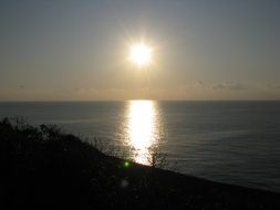 sunrise on the water tranquil scenery