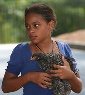 girl and chicken