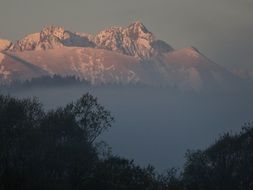 distant view of the Tatras in the haze
