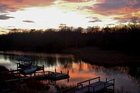 Picture of wooden pier on lake at the sunset