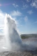 eruption of strokkur geyser, iceland