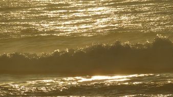 waves at sunset in monochrome image