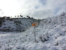mountain landscape in winter on a background cloudy sky