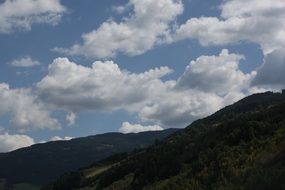 I white clouds over mountains