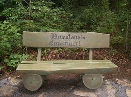 wooden bench with inscription