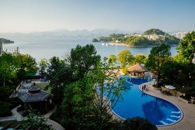 lake and blue swimming pool scenery