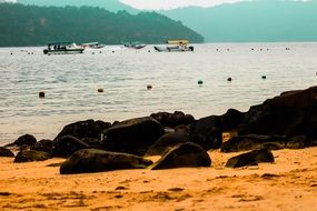 large black stones on tropical coast