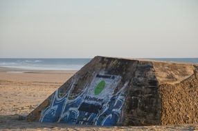 graffiti on a bunker on the beach