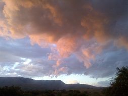 dramatic cloudy sky in mountains