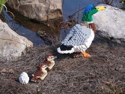 lego ducks on a lake