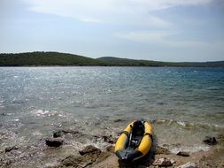 yellow kayak by the sea