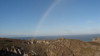 beautiful rainbow in mountains