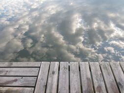 small wooden bridge near the water