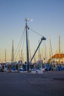 boats in port at dusk, argentina, buenos aires