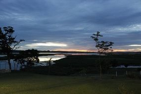 landscape of summer night in wilderness at river