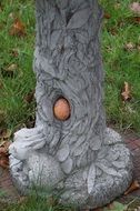 easter egg in hollow tree