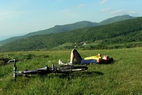 tourist with a bicycle in the mountains of Slovakia