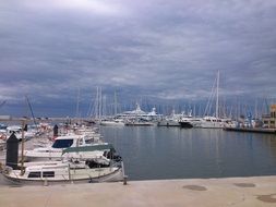 fishing boats in the port near the shore