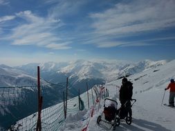 Picture of the people are on a snowy mountain top