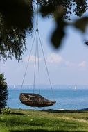 swing for relaxation near lake scenery