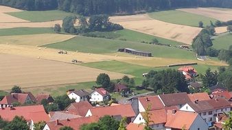 panorama of the village near agricultural fields